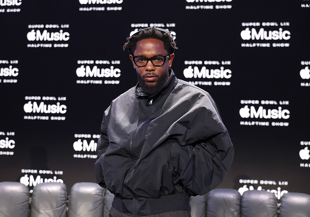 Kendrick Lamar at the Super Bowl LIX Apple Music Halftime Show press conference on Feb. 6 in New Orleans, athleisure, windbreaker, Asics