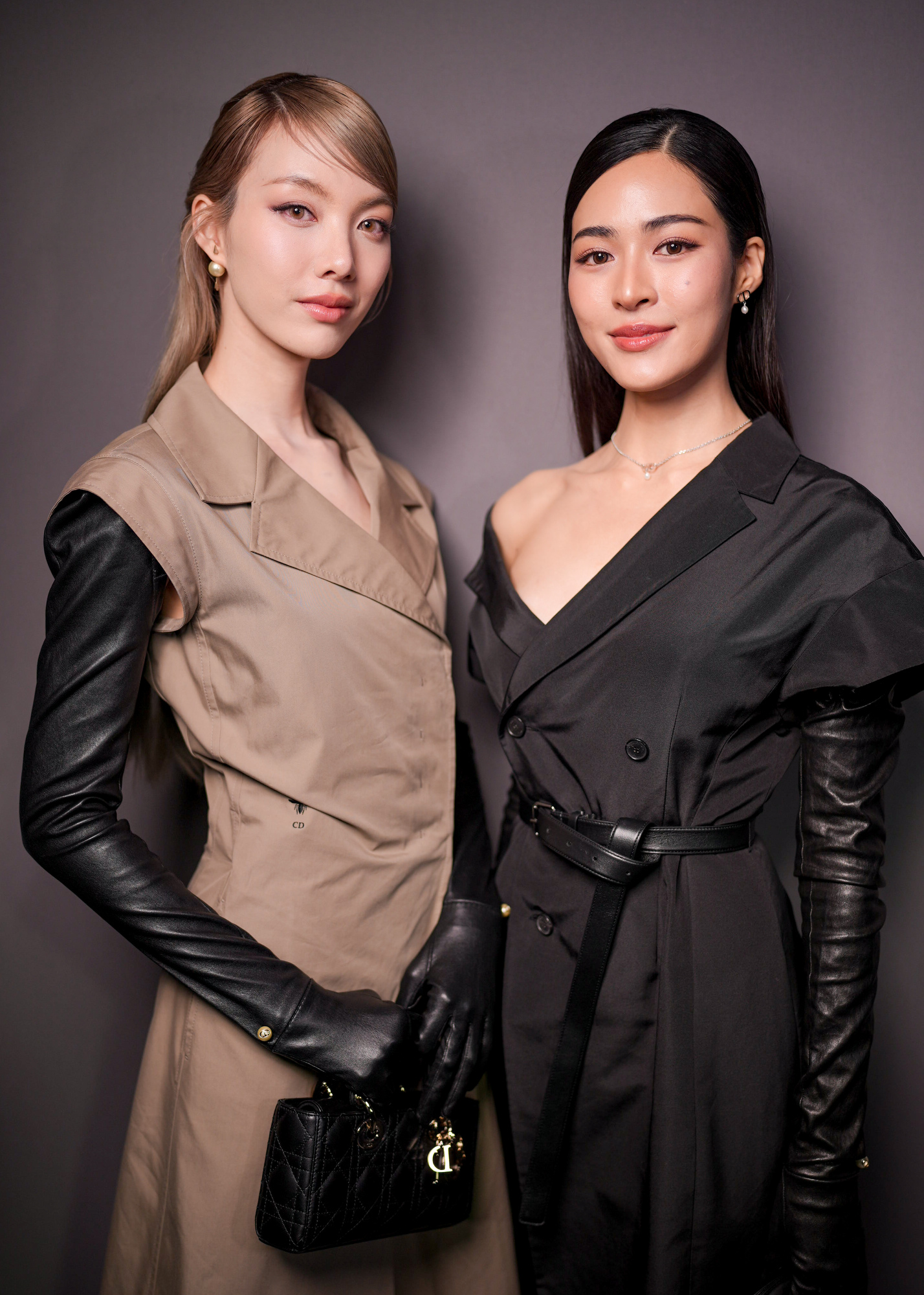 Kornnaphat Sethratanapong and LingLing Sirilak Kwong at the Christian Dior Fall RTW 2025.