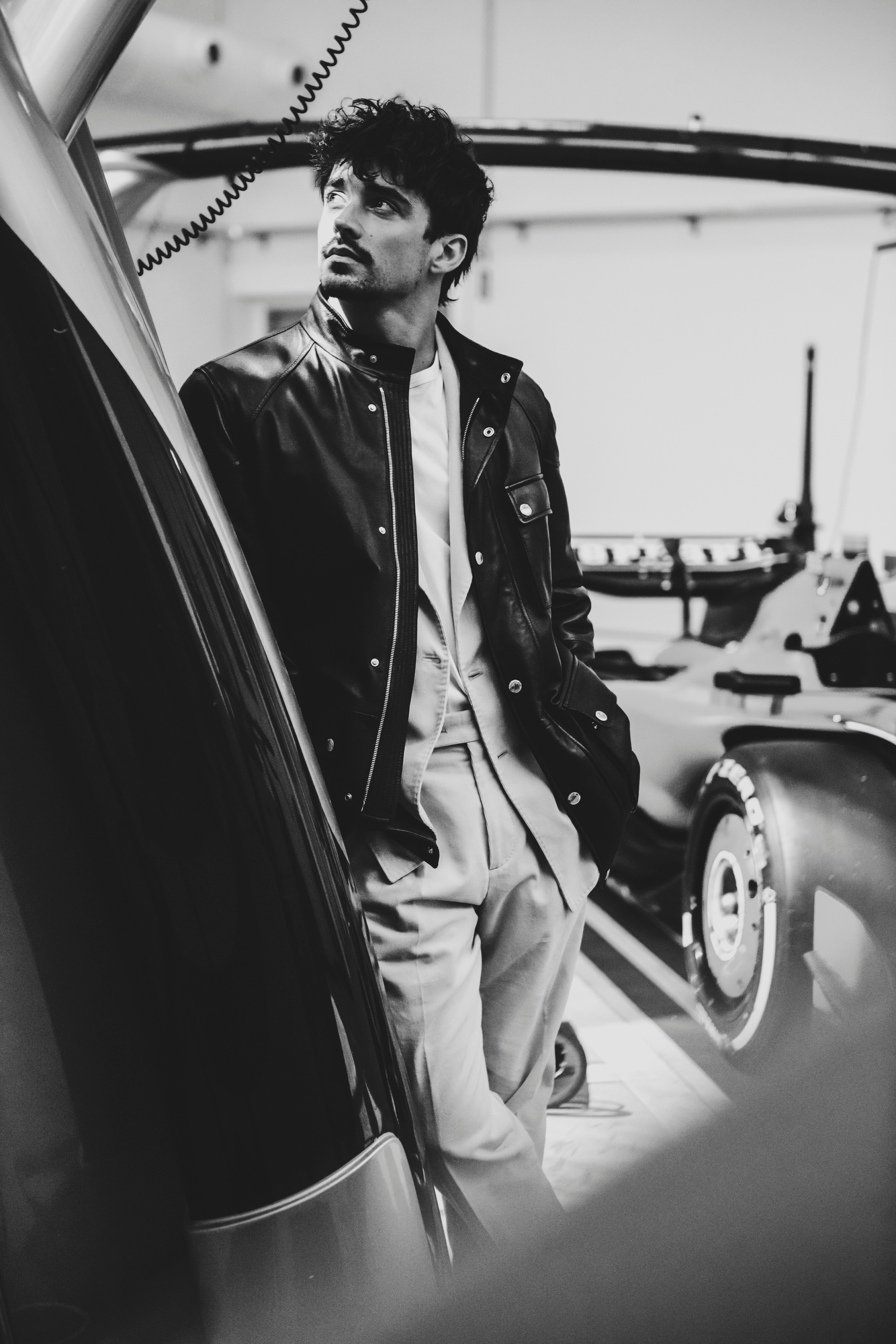 Brunello Cucinelli leather jacket and suit; Umit Benan shirt; Zegna loafers.