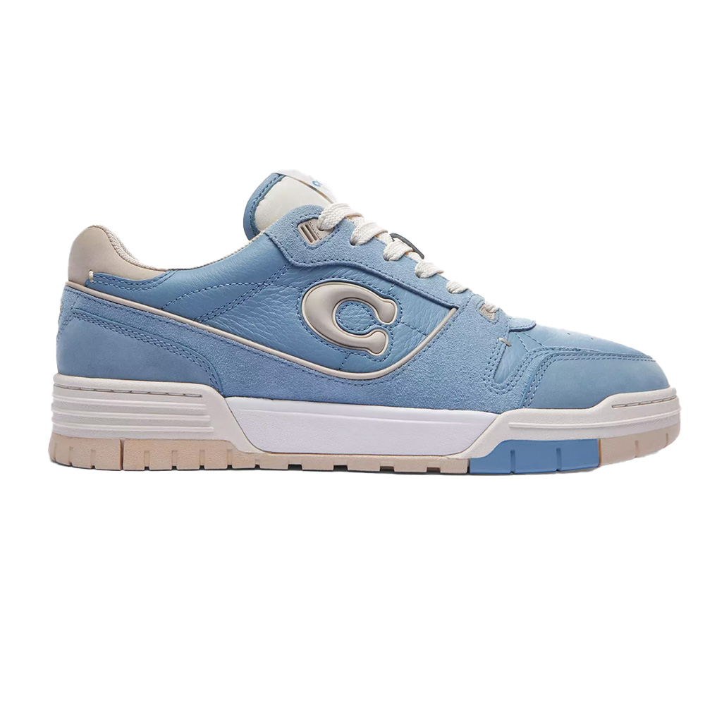 Coach’s ’90s Pack Soho Sneaker Hit On All Summer's Top Trends