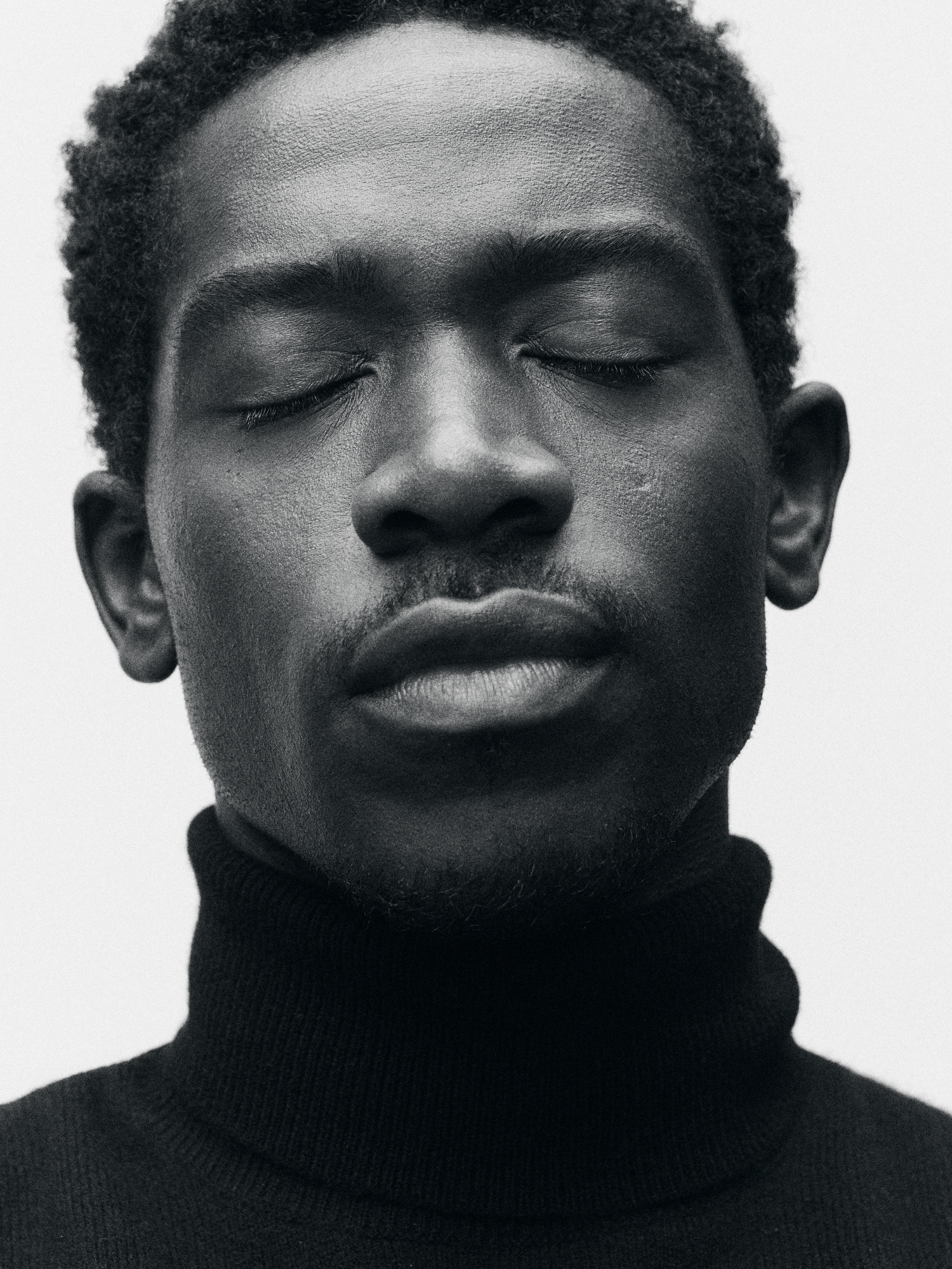 Brooks Brothers 3-ply cashmere turtleneck sweater.