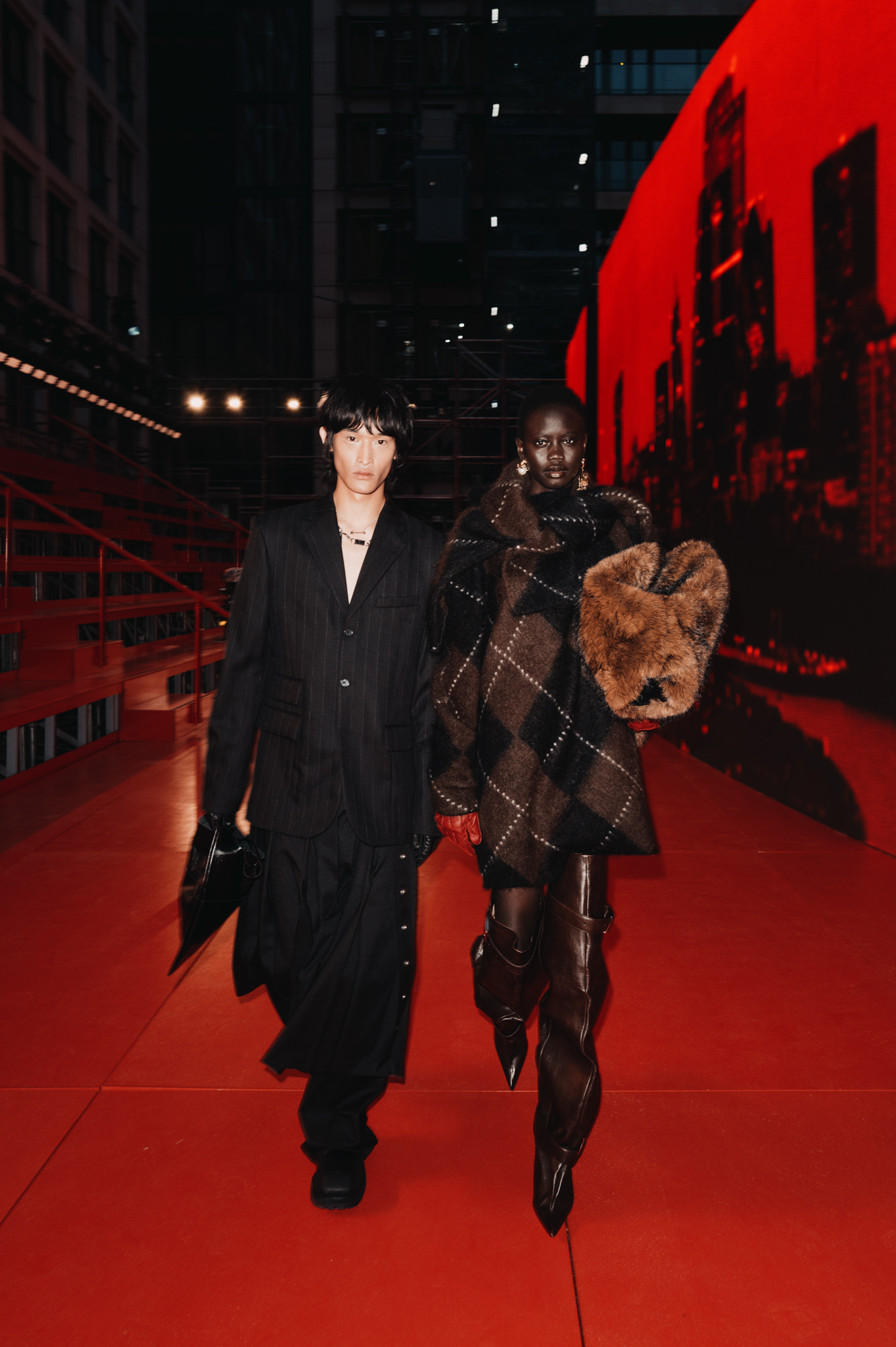Two looks from the H&M Studio runway presentation during London Fashion Week