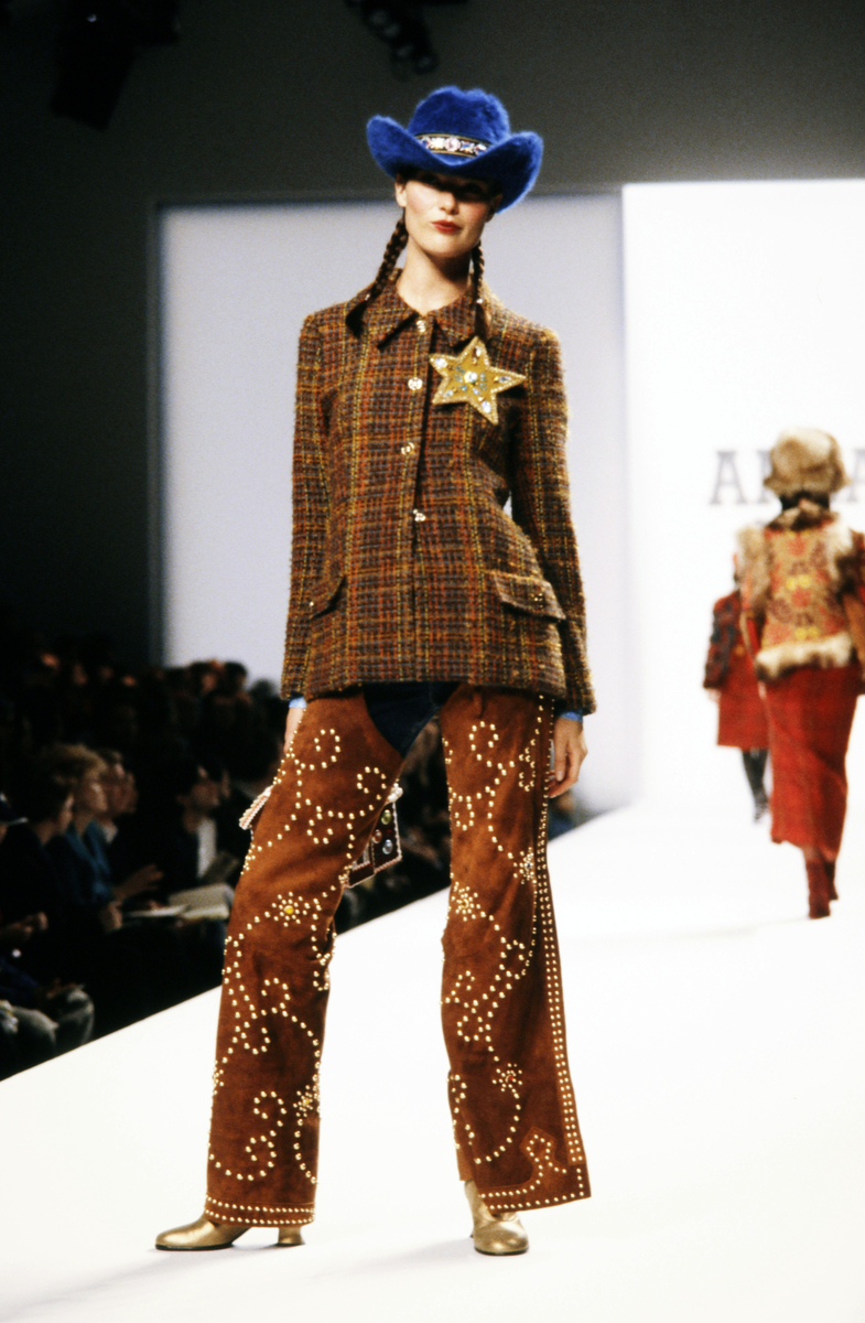 Model Shalom Harlow walks in the Anna Sui Fall 1998 Ready to Wear Runway Show on April 1, 1998, in New York City.