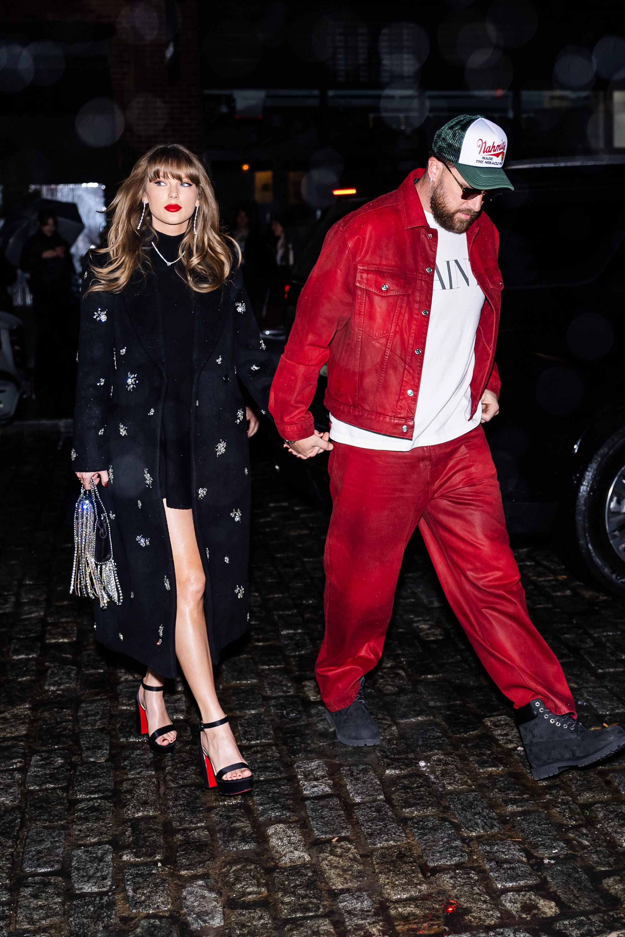 Taylor Swift (L) and Travis Kelce are seen in the Meatpacking District on December 28, 2024 in New York City. (Photo by TheStewartofNY/GC Images)