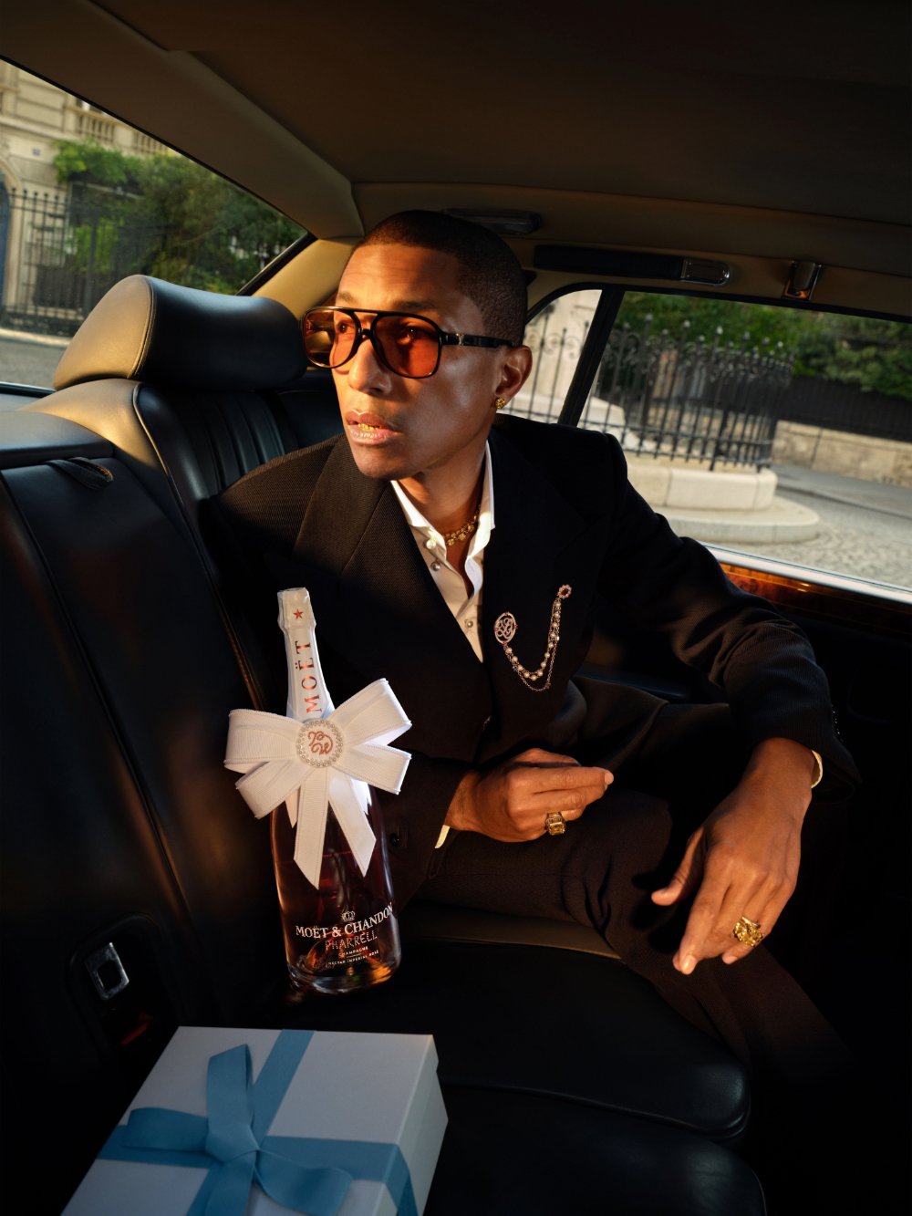 Pharrell Williams with a limited edition magnum of Moët & Chandon Nectar Impérial Rosé Champagne