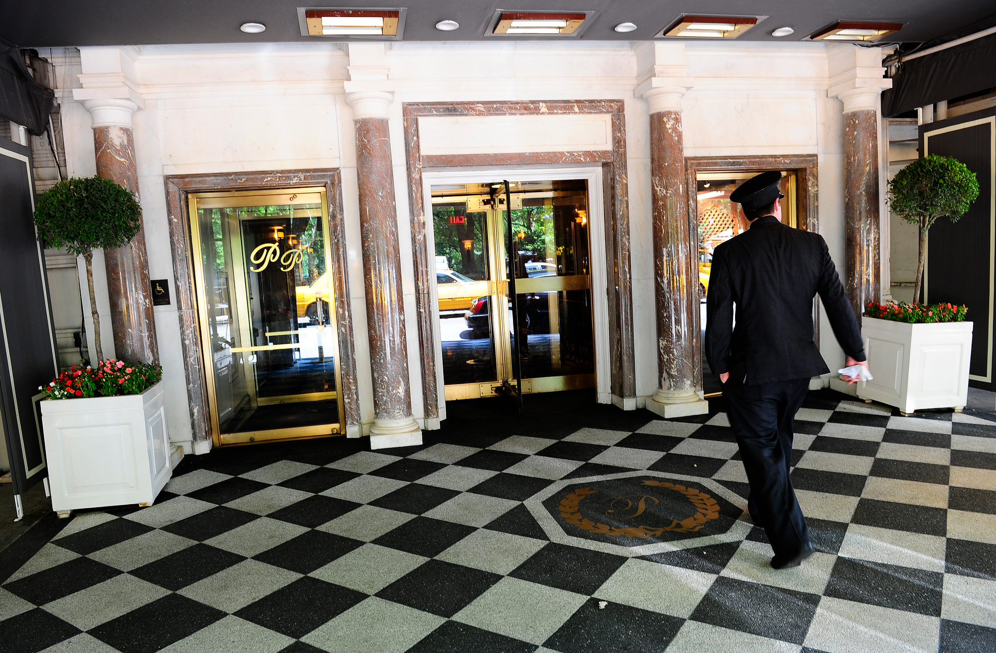 A view of the entrance of the Pierre Hotel in Manhattan where an Egyptian former bank chairman has been arrested for allegedly sexually assaulting a maid, in New York, May 31, 2010. Less than two weeks after a former IMF chief Dominique Strauss-Kahn was indicted on similar charges, Mahmoud Abdel Salam Omar, 74, the former director of the Bank of Alexandria and now the chairman of the El-Mex Salines Company, was arrested after a Pierre Hotel maid accused him of sexually assaulting her, police said.
